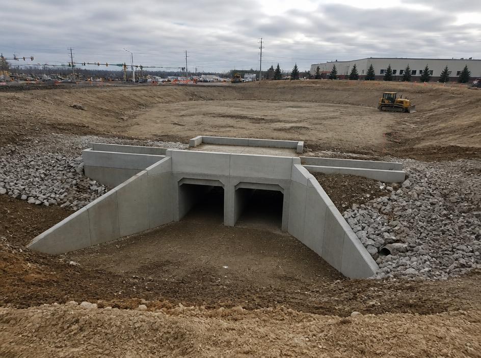 Concrete storm water culvert and detention basin under construction
